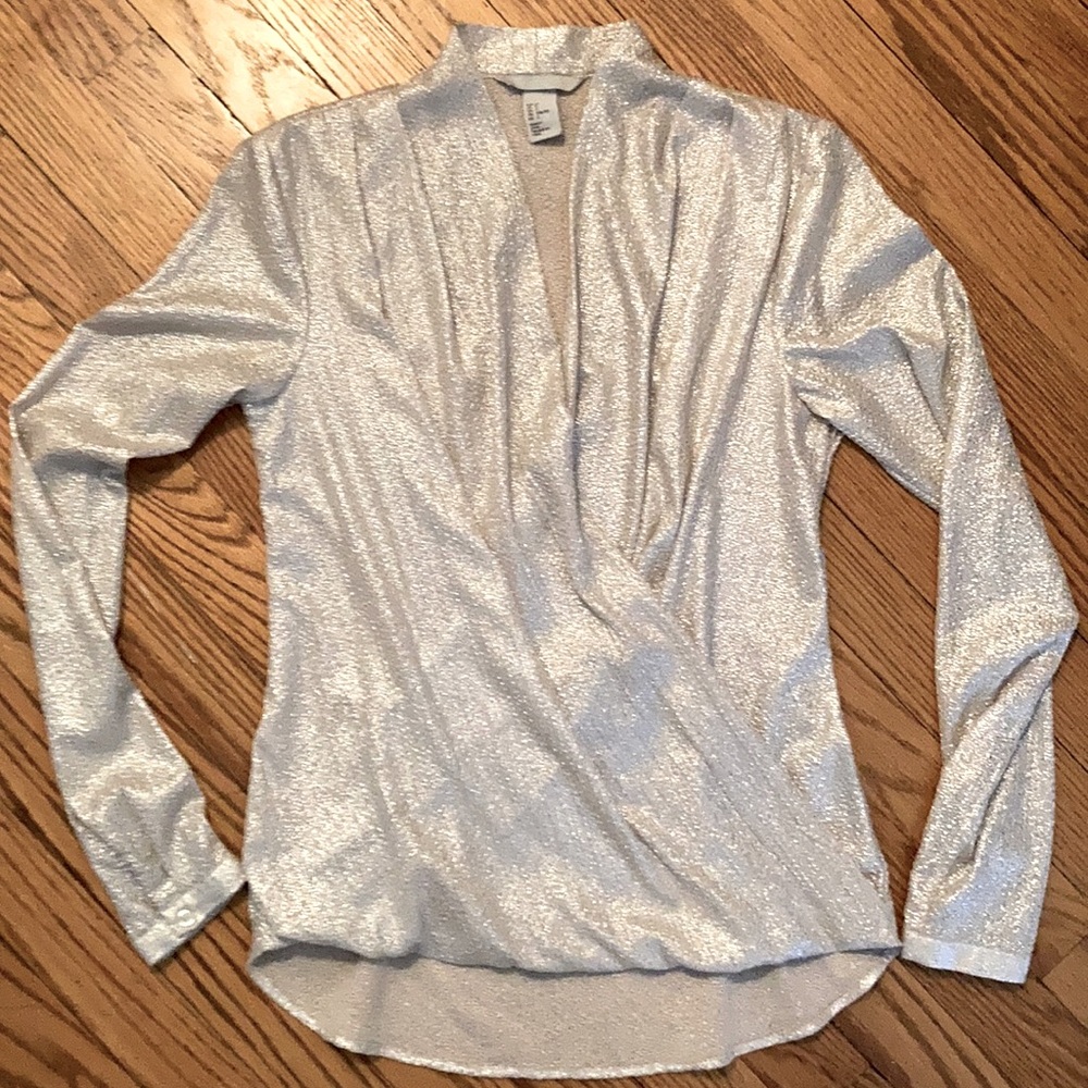 H&M size 2.  Barely worn silver sparkle top